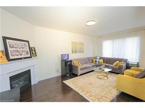 11 Cirillo Street, Brampton, ON - Indoor Photo Showing Living Room With Fireplace