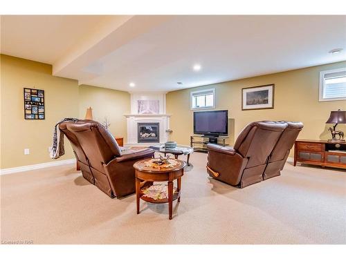 77 Michael Drive, Welland, ON - Indoor Photo Showing Basement With Fireplace