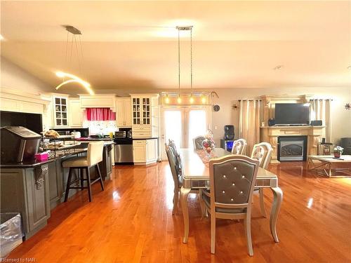 4956 Dorchester Road, Niagara Falls, ON - Indoor Photo Showing Dining Room With Fireplace