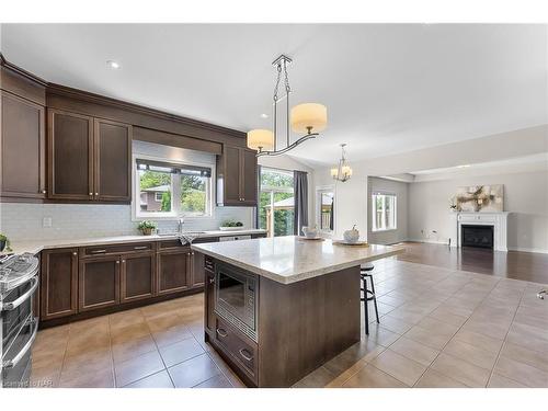 689 Brian Street, Fort Erie, ON - Indoor Photo Showing Kitchen With Fireplace With Double Sink