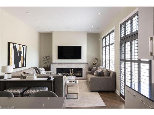 8-2 Black Walnut Common, St. Catharines, ON - Indoor Photo Showing Living Room With Fireplace