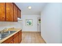 6602 Barker Street, Niagara Falls, ON  - Indoor Photo Showing Kitchen With Double Sink 