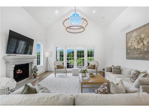 338 Hwy 20 W, Fenwick, ON - Indoor Photo Showing Living Room With Fireplace