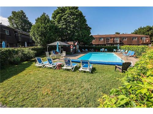 23-122 Lakeshore Road, St. Catharines, ON - Outdoor With In Ground Pool With Backyard With Exterior