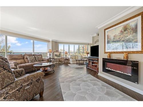 2201-701 Geneva Street, St. Catharines, ON - Indoor Photo Showing Living Room With Fireplace