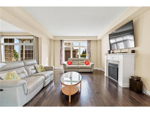 4037 Bush Crescent, Beamsville, ON - Indoor Photo Showing Living Room With Fireplace