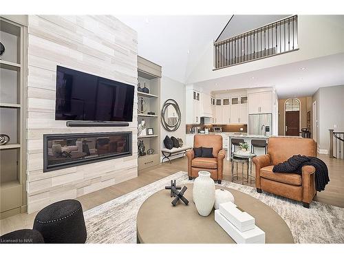 18-190 Canboro Road, Fonthill, ON - Indoor Photo Showing Living Room With Fireplace