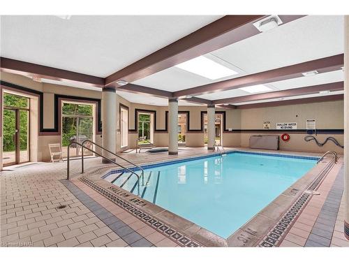 328-8111 Forest Glen Drive, Niagara Falls, ON - Indoor Photo Showing Other Room With In Ground Pool