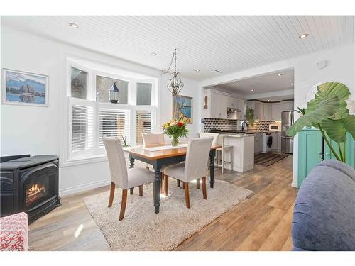 21 Johnston Street, St. Catharines, ON - Indoor Photo Showing Dining Room With Fireplace