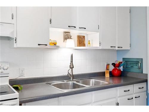 59 Woodland Avenue, St. Catharines, ON - Indoor Photo Showing Kitchen With Double Sink