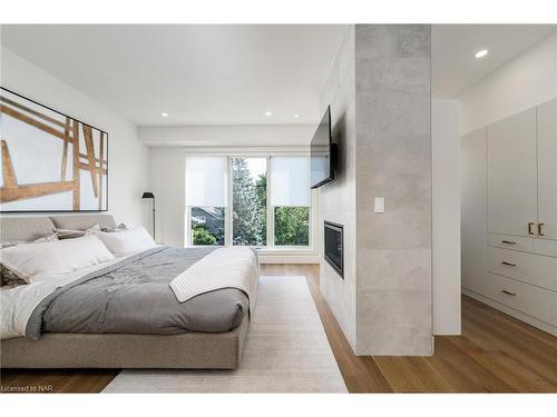 10-1397 York Road, Niagara-On-The-Lake, ON - Indoor Photo Showing Bedroom With Fireplace