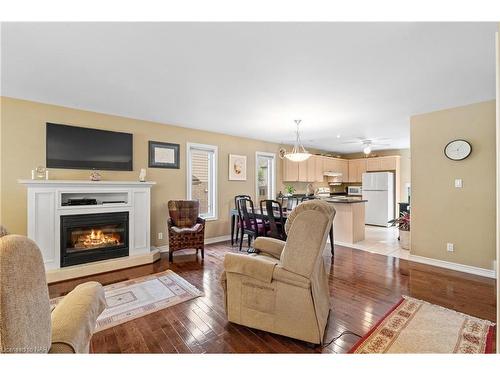 27 Cozocar Crescent, St. Catharines, ON - Indoor Photo Showing Living Room With Fireplace