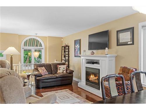 27 Cozocar Crescent, St. Catharines, ON - Indoor Photo Showing Living Room With Fireplace