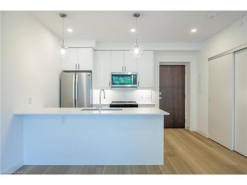 203-118 West Street, Port Colborne, ON - Indoor Photo Showing Kitchen With Stainless Steel Kitchen