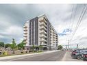 203-118 West Street, Port Colborne, ON  - Outdoor With Balcony With Facade 