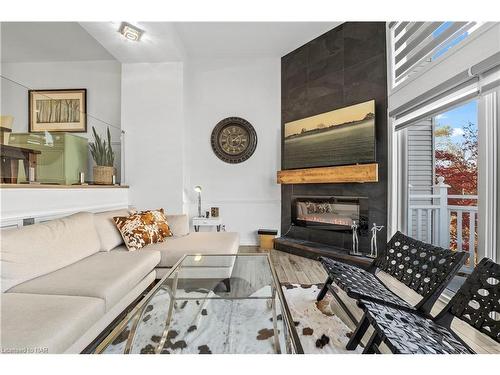 12-1 Lakeside Drive, St. Catharines, ON - Indoor Photo Showing Living Room With Fireplace