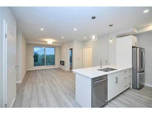 704-118 West Street, Port Colborne, ON - Indoor Photo Showing Kitchen With Stainless Steel Kitchen With Double Sink With Upgraded Kitchen