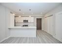 704-118 West Street, Port Colborne, ON  - Indoor Photo Showing Kitchen 