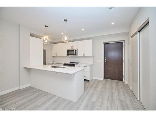 704-118 West Street, Port Colborne, ON - Indoor Photo Showing Kitchen With Double Sink With Upgraded Kitchen