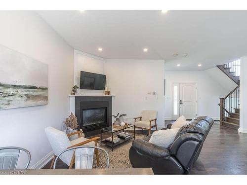 20 Jubilee Drive, St. Catharines, ON - Indoor Photo Showing Living Room With Fireplace