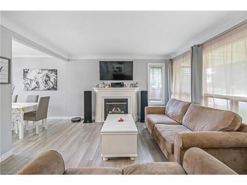 5019 Shirley Avenue, Niagara Falls, ON - Indoor Photo Showing Living Room With Fireplace