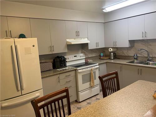 202-5222 Portage Road, Niagara Falls, ON - Indoor Photo Showing Kitchen With Double Sink