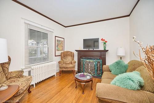 54 Henry Street, St. Catharines, ON - Indoor Photo Showing Living Room With Fireplace