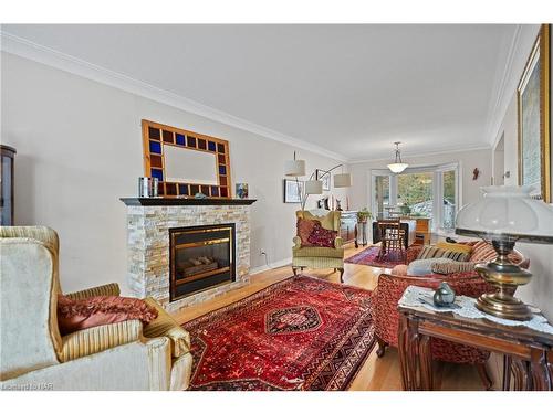 243 Vansickle Road, St. Catharines, ON - Indoor Photo Showing Living Room With Fireplace