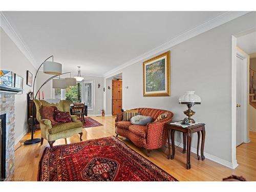 243 Vansickle Road, St. Catharines, ON - Indoor Photo Showing Living Room With Fireplace