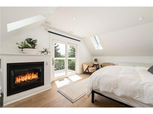 698 Rye Street, Niagara-On-The-Lake, ON - Indoor Photo Showing Bedroom With Fireplace