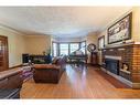 5008 Valley Way, Niagara Falls, ON  - Indoor Photo Showing Living Room With Fireplace 