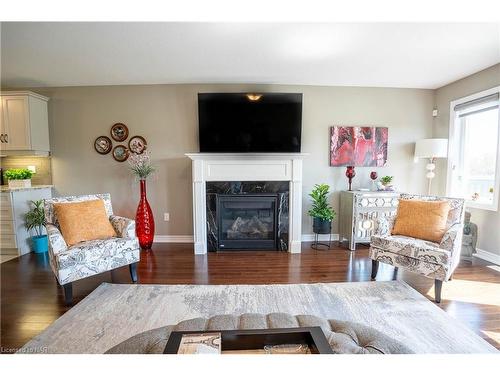 14-77 Avery Crescent, St. Catharines, ON - Indoor Photo Showing Living Room With Fireplace