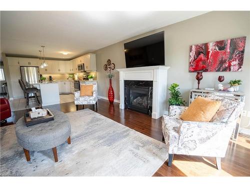 14-77 Avery Crescent, St. Catharines, ON - Indoor Photo Showing Living Room With Fireplace