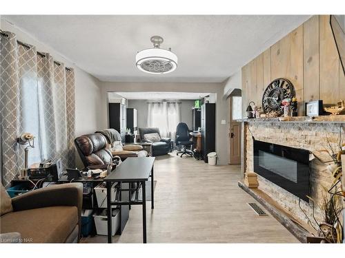 6268 Drummond Road, Niagara Falls, ON - Indoor Photo Showing Living Room With Fireplace