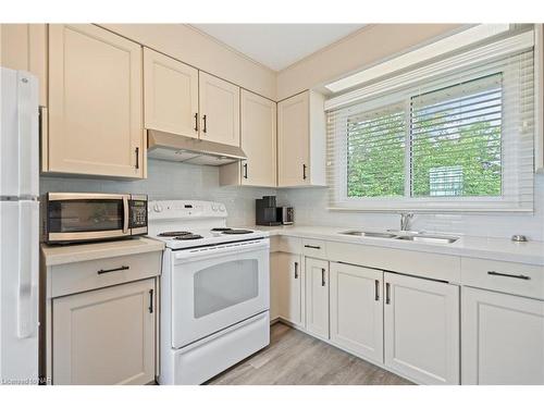 1677 Gregory Road, St. Catharines, ON - Indoor Photo Showing Kitchen With Double Sink