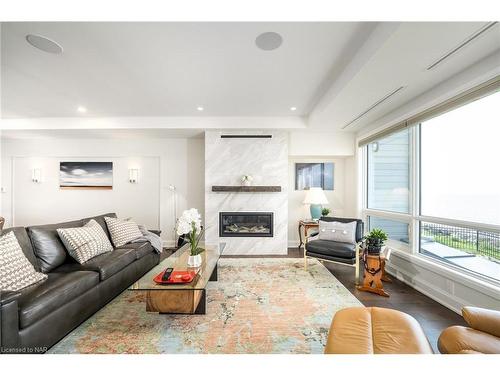 102-10 Dalhousie Avenue, St. Catharines, ON - Indoor Photo Showing Living Room With Fireplace