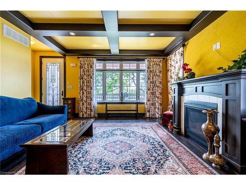 4807 Zimmerman Avenue, Niagara Falls, ON - Indoor Photo Showing Living Room With Fireplace