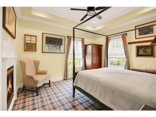 619 King Street, Niagara-On-The-Lake, ON - Indoor Photo Showing Bedroom With Fireplace