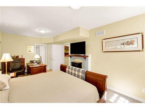 619 King Street, Niagara-On-The-Lake, ON - Indoor Photo Showing Bedroom With Fireplace