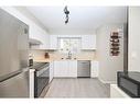 73-65 Dorchester Boulevard, St. Catharines, ON  - Indoor Photo Showing Kitchen With Stainless Steel Kitchen With Double Sink 