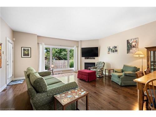 4-6753 O'Neill Street, Niagara Falls, ON - Indoor Photo Showing Living Room With Fireplace