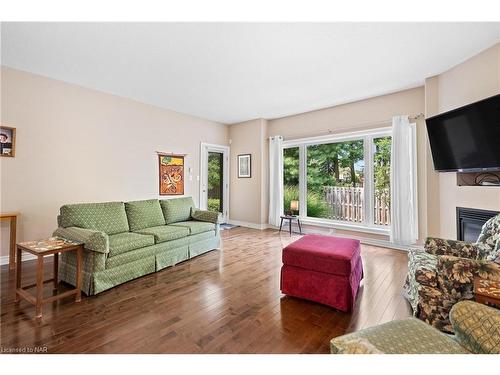 4-6753 O'Neill Street, Niagara Falls, ON - Indoor Photo Showing Living Room With Fireplace