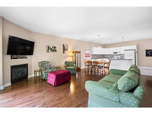 4-6753 O'Neill Street, Niagara Falls, ON - Indoor Photo Showing Living Room With Fireplace