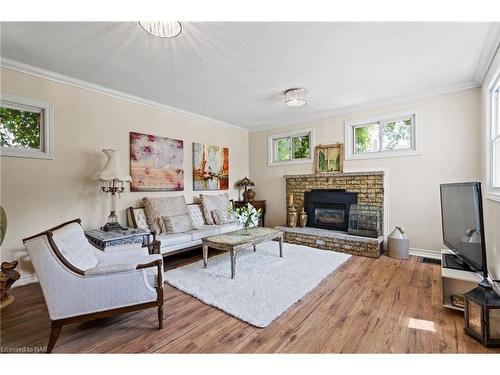 2 Carleton Street N, Thorold, ON - Indoor Photo Showing Living Room With Fireplace