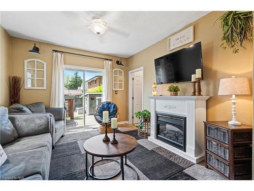 84 Steele Street, Port Colborne, ON - Indoor Photo Showing Living Room With Fireplace