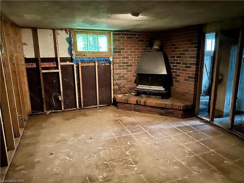 1400 Orchard Avenue, Fort Erie, ON - Indoor Photo Showing Other Room With Fireplace