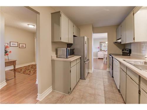 402-141 Church Street, St. Catharines, ON - Indoor Photo Showing Kitchen With Double Sink