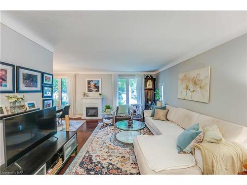 3195 St. Patrick Avenue, Niagara Falls, ON - Indoor Photo Showing Living Room With Fireplace