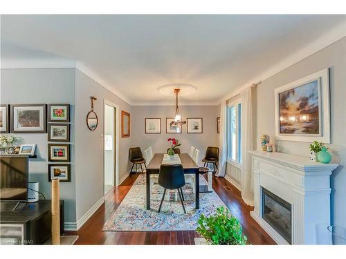 3195 St. Patrick Avenue, Niagara Falls, ON - Indoor Photo Showing Dining Room With Fireplace