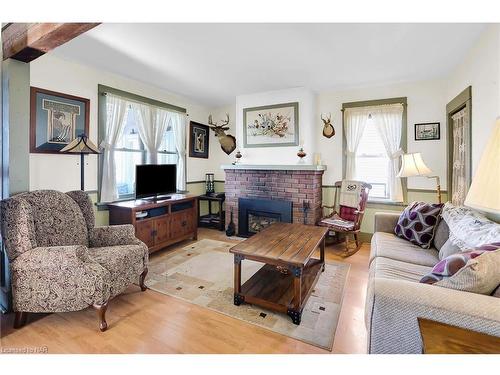 11611 Beach Road W, Wainfleet, ON - Indoor Photo Showing Living Room With Fireplace